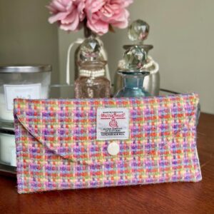 Multi-coloured Harris Tweed with cream coloured fabric lining